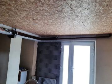 Isolation entre un sous sol et l'habitation , puis mise en place d'un plafond type OSB